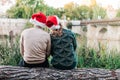 Back view of a couple in Santa hats on Christmas 2021.Concept of reunion and return home.with empty space Royalty Free Stock Photo