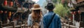 Back view of a couple of travelers admiring a view of spectacular Chinese landscape. Vacation in China