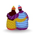 Back view of couple wearing woollen clothes.