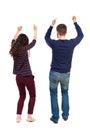 Back view of dancing young couple. Dance party. Royalty Free Stock Photo