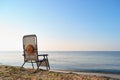 Back view deskchair in morning sea landscape. Royalty Free Stock Photo