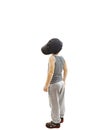 Back view of fashionable little boy.Hip-Hop Style looking at wall. Royalty Free Stock Photo