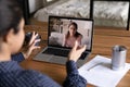 Back view of female colleagues talk on video call Royalty Free Stock Photo