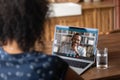 Back view of woman have video call with colleague Royalty Free Stock Photo