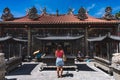 Back view of a female looking at the old Chinese buddhist temple in Georgetown, Penang, Malaysia Royalty Free Stock Photo