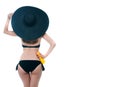 Back view of Girl in black bikini and big black hat