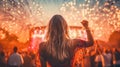 Back view of a girl dancing in front of the crowd at a music festival Royalty Free Stock Photo