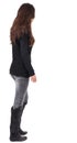 Back view of going woman in jeans and sweater Royalty Free Stock Photo