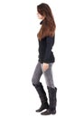 Back view of going woman in jeans and sweater Royalty Free Stock Photo