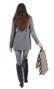 Back view of going woman with shopping bags Royalty Free Stock Photo