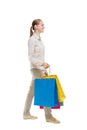 Back view of going woman with shopping bags Royalty Free Stock Photo