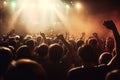 Back view of group of people attending live concert. Dancing, listening to music and having fun. Hands up Royalty Free Stock Photo