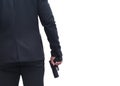 back view of gun man wearing black suit holding pistol on white background Concept for assassin, murder, criminal, bandit Royalty Free Stock Photo