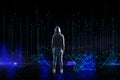 Back view of hacker in hoodie looking at abstract polygonal lines on dark background. Big data, technology, metaverse and future