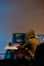 Back view of hacker programming script or code Royalty Free Stock Photo