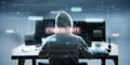 Back view of hacker sitting at desk and using computers with glowing hacking hologram with binary code and lines. Cybersecurity, Royalty Free Stock Photo