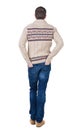Back view of handsome man in warm sweater looking up. Royalty Free Stock Photo