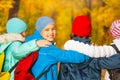 Back view of happy children with rucksacks Royalty Free Stock Photo