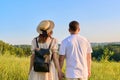 Back view, happy middle aged couple looking to horizon, nature summer background Royalty Free Stock Photo