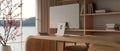 Back view image of a modern, luxury private office with a computer on a modern wooden desk Royalty Free Stock Photo