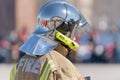 Back view of inscription Fire on uniform firefighter Emercom of Russia, Ministry of Civil Defence, Emergencies and Royalty Free Stock Photo