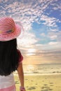 Back view of little girl looking to the beach with blue sky at s Royalty Free Stock Photo