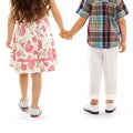 Back view of little kids holding hands at sunset Royalty Free Stock Photo