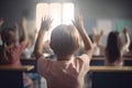 Back view of little schoolgirl raising hands up while sitting in classroom, Little students full rear view raising their hands, Ai