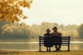 Back view of senior couple sitting on bench in the park Royalty Free Stock Photo