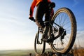 back view of a man with bicycle against the sky Royalty Free Stock Photo