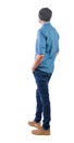 Back view of man in dark jeans. Standing young guy. Rear view people collection. Isolated over white background. A guy in summer