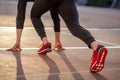 Man feet in starting position for running on race track in stadium Royalty Free Stock Photo