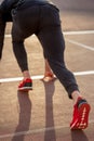 Man feet in starting position for running on race track in stadium Royalty Free Stock Photo