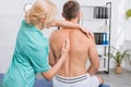 back view of man having chiropractic adjustment Royalty Free Stock Photo