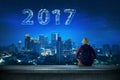 Back view man looking 2017 on the sky Royalty Free Stock Photo