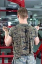 Back view of a man performing biceps workout Royalty Free Stock Photo