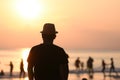 Back view of a man silhouette standing and watching sun Royalty Free Stock Photo