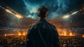 Back view man standing in a soccer stadium Royalty Free Stock Photo