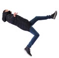 Back view man in winter jacket Balances waving his arms Royalty Free Stock Photo