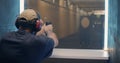 Professional shooter firing at target Royalty Free Stock Photo