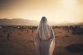 Back View of a Moslem Woman Pilgrim Wearing Hajj Clothes in Arabian Desert of Arafah