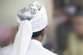 Back view Muslim man wearing turban