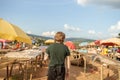 Young man visiting the Kimironko market in Rwanda Royalty Free Stock Photo