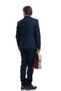 Back view of an old businessman holding his suit case Royalty Free Stock Photo