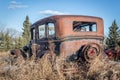 Back view of an old rusty model T car. Royalty Free Stock Photo