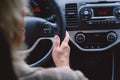 Back view of old woman sitting inside the car Royalty Free Stock Photo