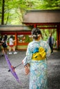 Back view of woman wearing Japanese yukata summer kimono Royalty Free Stock Photo