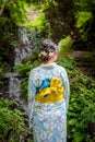 Back view of woman wearing Japanese yukata summer kimono