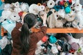 Back view photo of young female clothing maker