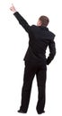 Back view of pointing business man. Royalty Free Stock Photo